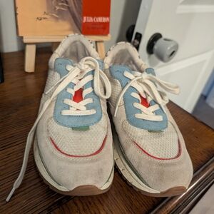 Stylish White and Blue Sneakers with Red Accents